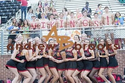 Varsity football rain game with band